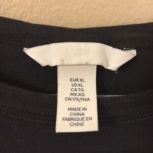 Black XL T-Shirt with White Size Tag